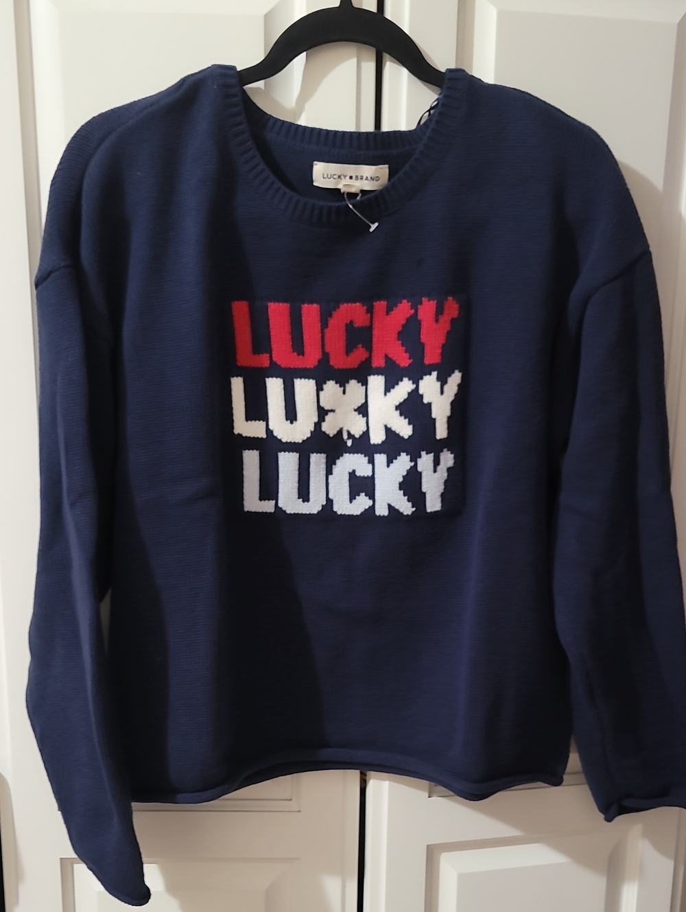 NWOT Lucky Brand Women's Navy Crewneck Sweater with Red and White 'LUCKY Graphic